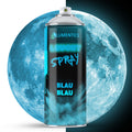 Glow Spray Blue-Blue 400 ml in front of a moon, daylight on the left, glowing blue in the dark on the right