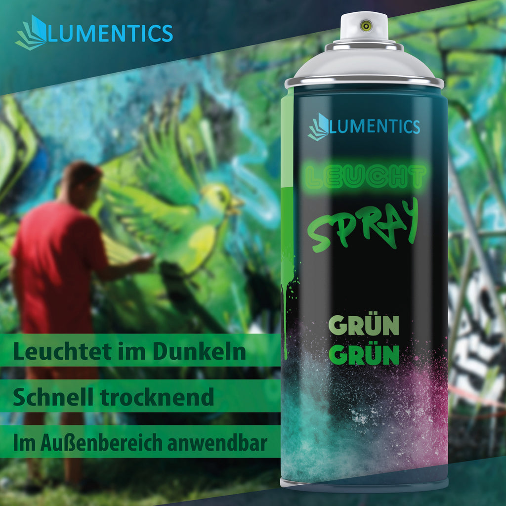 Glow Spray Green-Green 400 ml: person in a red shirt spraying a bird graffiti, with the can in front