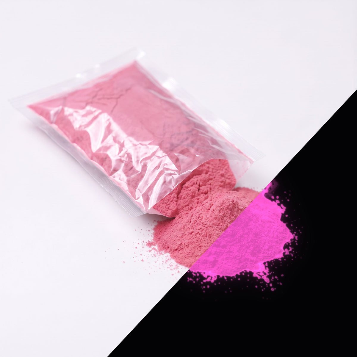 Fine glow pigment Pink-Pink 100 g: cut-open bag and a small heap of fine powder, pink by day, glowing pink in the dark (lower right)