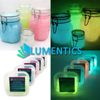 Glow Jelly with Glitter: jars and tubs in blue, yellow, pink and white, in daylight and glowing in the dark