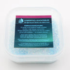 Glow Jelly with Glitter Blue/Blue-Green 45 g in its tub in daylight, light blue with glitter particles