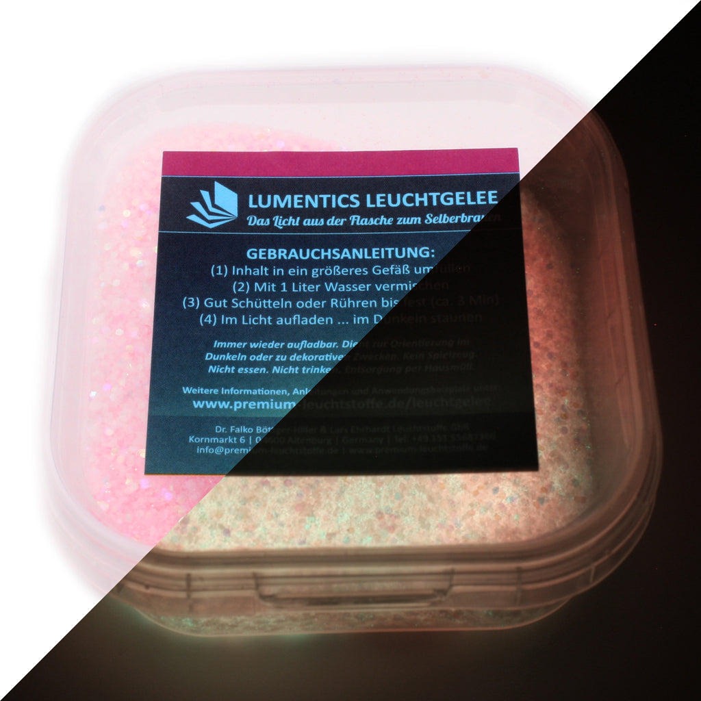 Glow Jelly with Glitter Pink/Yellow-Green 45 g: tub with label, pink by day and glowing in the dark at lower right
