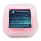 Glow Jelly with Glitter Pink/Yellow-Green 45 g: tub of pink glitter powder with instructions in daylight