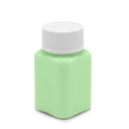Glow in the Dark Paint Green 100 g bottle with white cap in daylight, light green