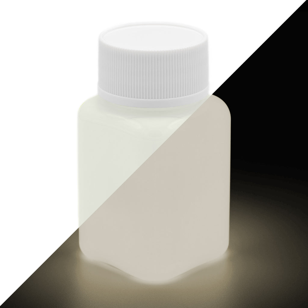 Glow in the Dark Paint Natural White 100 g bottle, split diagonally: whitish in daylight, glowing warm whitish in the dark