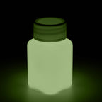 Glow in the Dark Paint Orange 100 g: bottle in the dark, glowing greenish