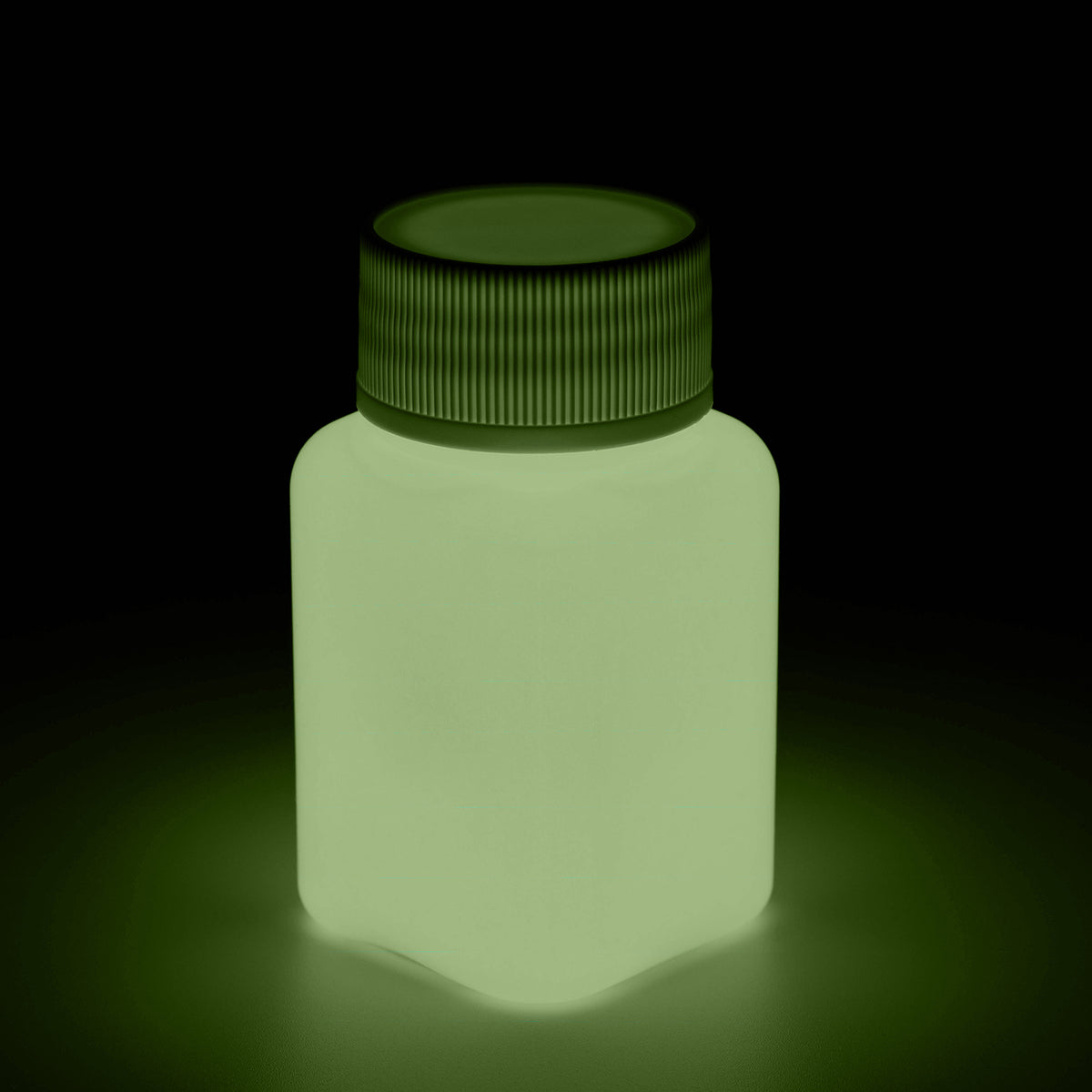 Glow in the Dark Paint Orange 100 g: bottle in the dark, glowing greenish