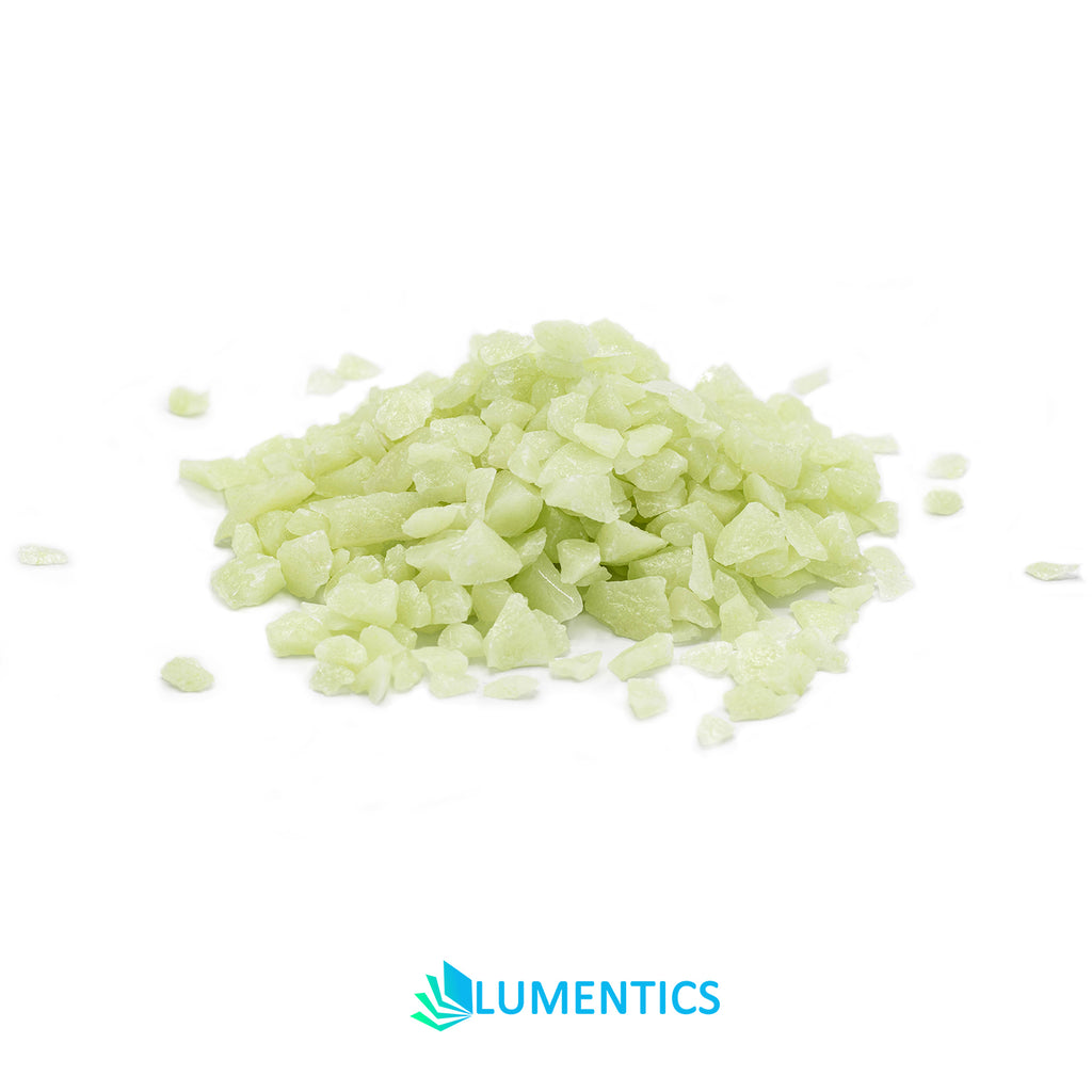 Pile of Glow Granules Green 4 mm in daylight on white, pale green