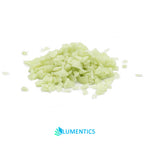 Pile of Glow Granules Green 4 mm in daylight on white, pale green