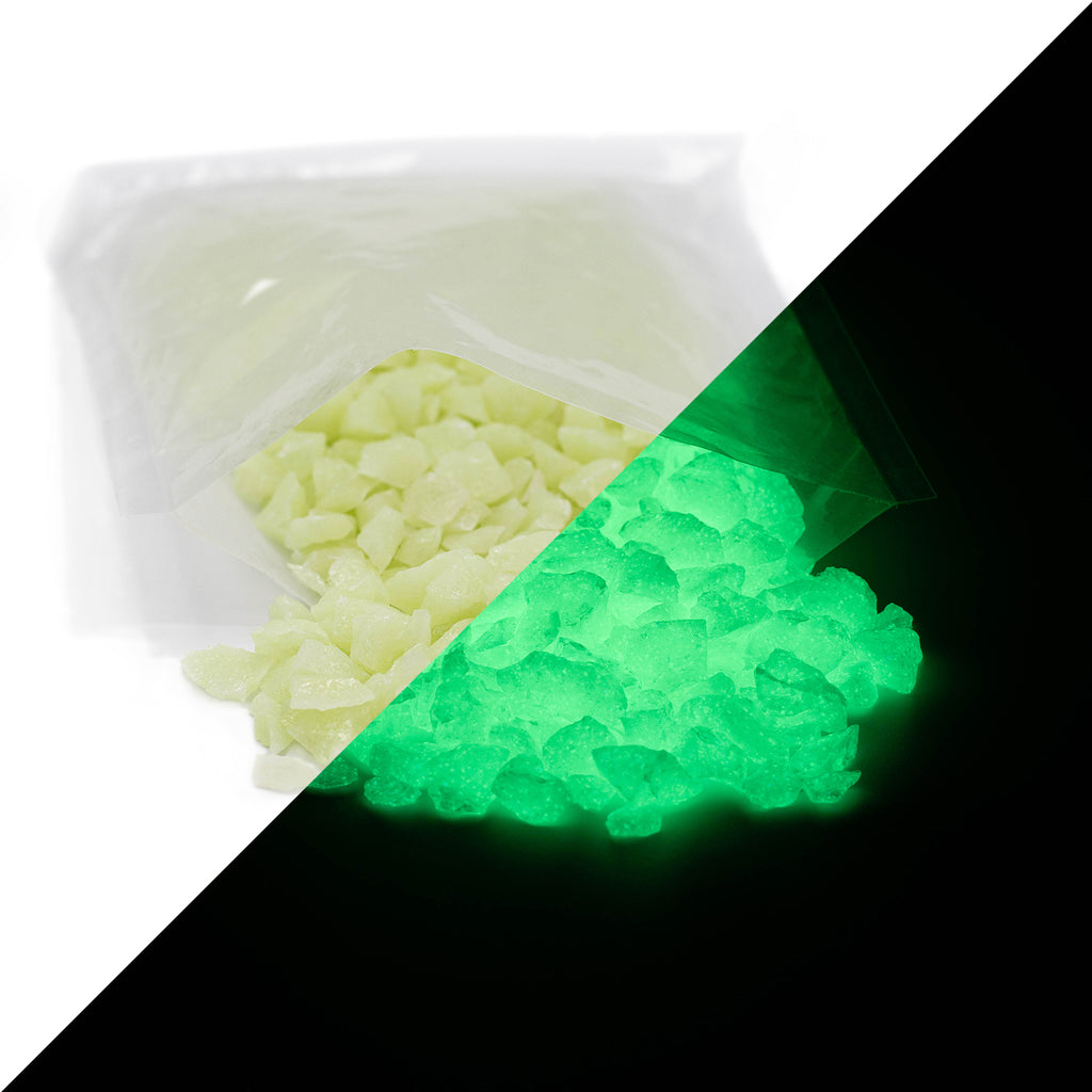 Glow Granules Green 4 mm with an opened bag, daylight on the left, glowing green in the dark on the right
