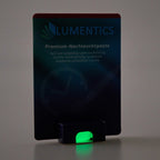 Luminous Paint for Watch Hands Yellow-Green 2 g: card in dim light, the paste in the tub glowing green