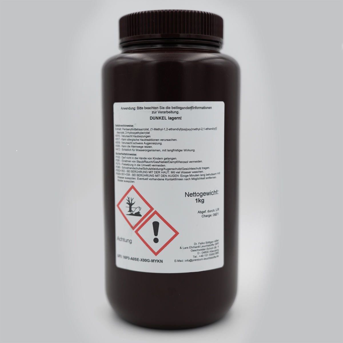 3D Printing Resin Clear: back of the brown 1 kg bottle with information label and hazard pictograms