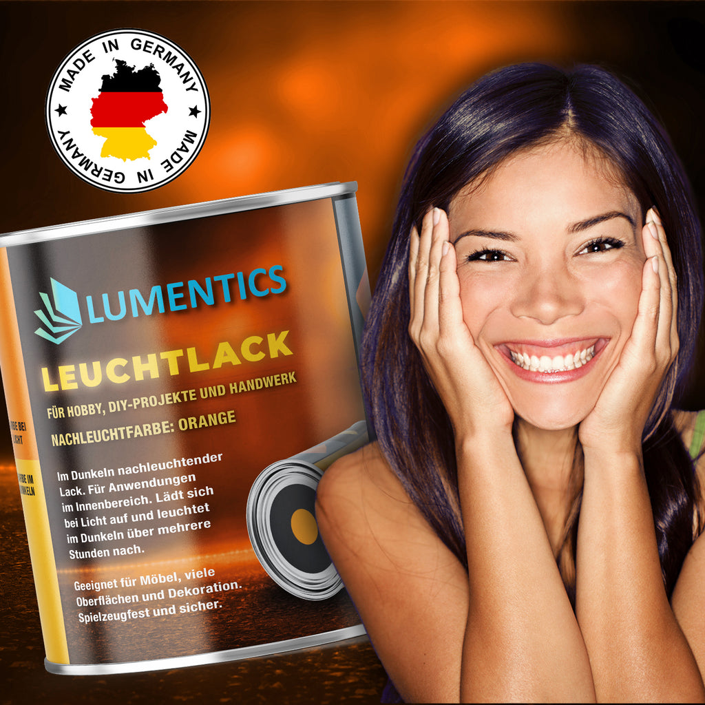 Glow in the dark varnish Orange 250 ml, tin with Made in Germany badge in front of a smiling woman