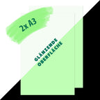 Glow paper for laser printers, 2 x A3 glossy: graphic with two sheets, daylight and glow in the dark