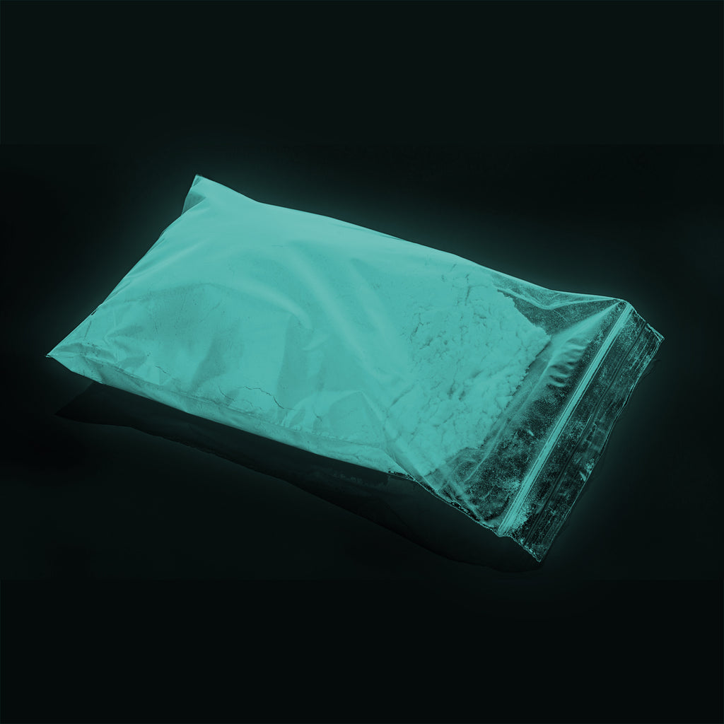 Powder Coating Blue-Green 1 kg in a zip bag, glowing blue-green in the dark