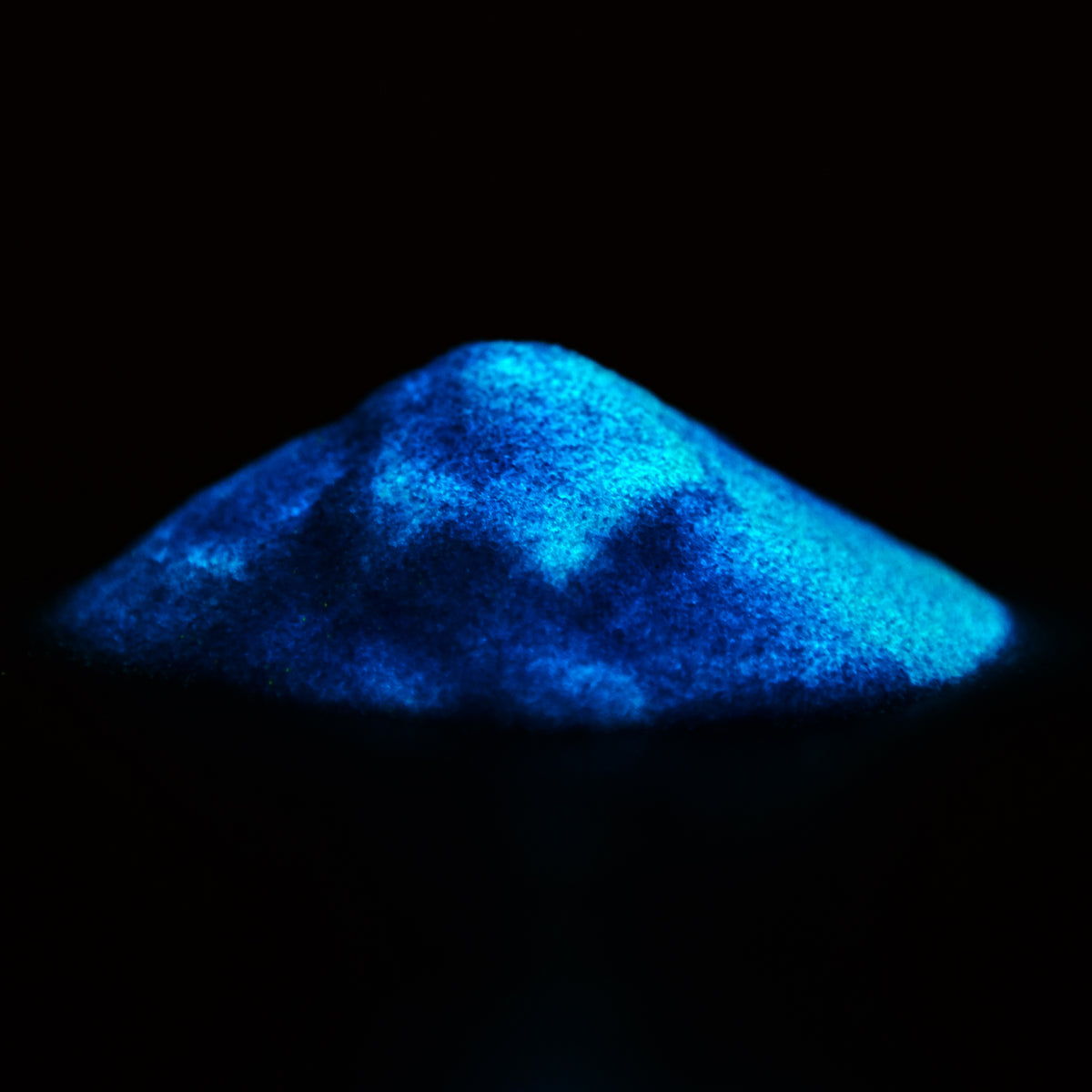Pile of glitter powder Blue 50 g in the dark, the powder glowing blue