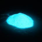 Glitter powder blue-green 50 g: small heap glowing light blue in the dark