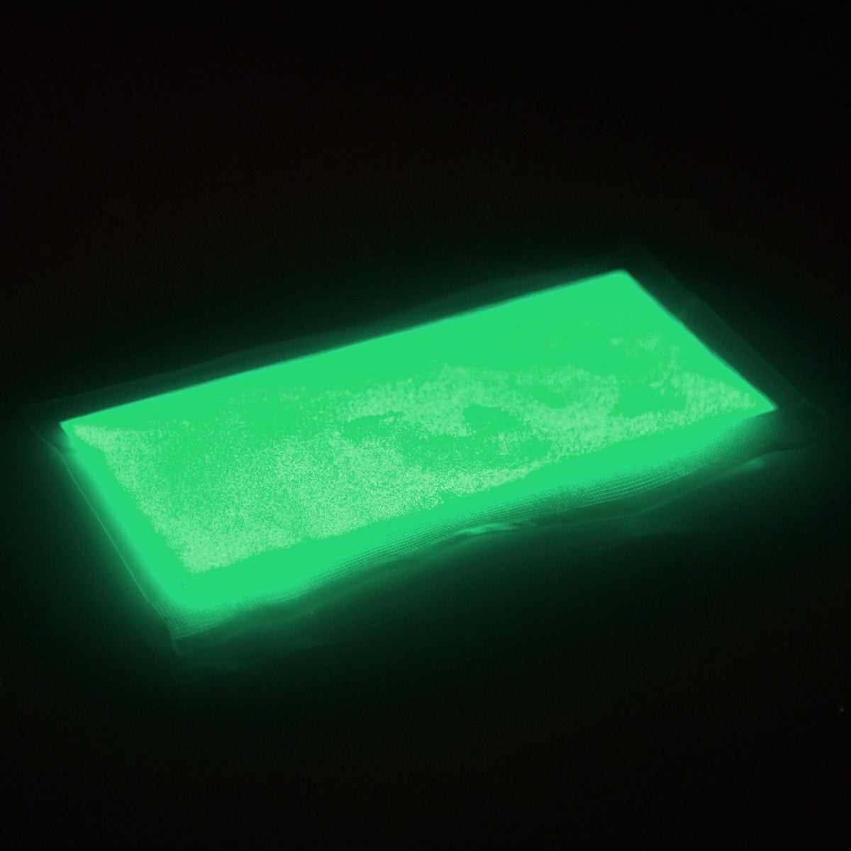 Glitter Powder Green 50 g: pouch glowing green in the dark
