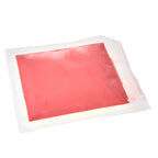 Glow in the Dark Powder Red 40 g: powder in a clear bag in daylight, red