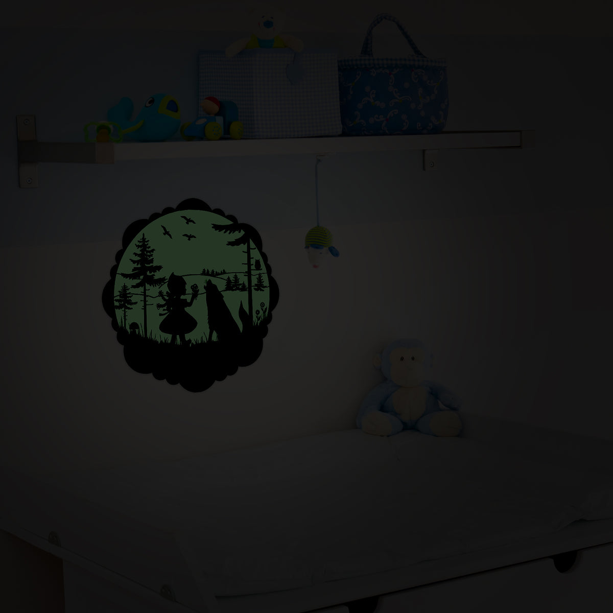Fairy-Tale Sticker Little Red Riding Hood 30 cm on a nursery wall in a darkened room, glowing greenish