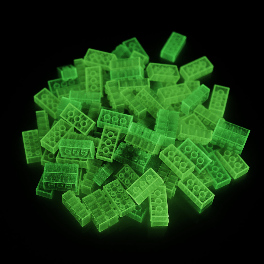 Building Bricks 2x4 Yellow in a pile in the dark, glowing green