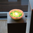 Glow Stones Green 300 g as decoration: tealight in a bowl filled with stones