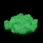 Glow Stones Green 300 g: pile of stones glowing green in the dark