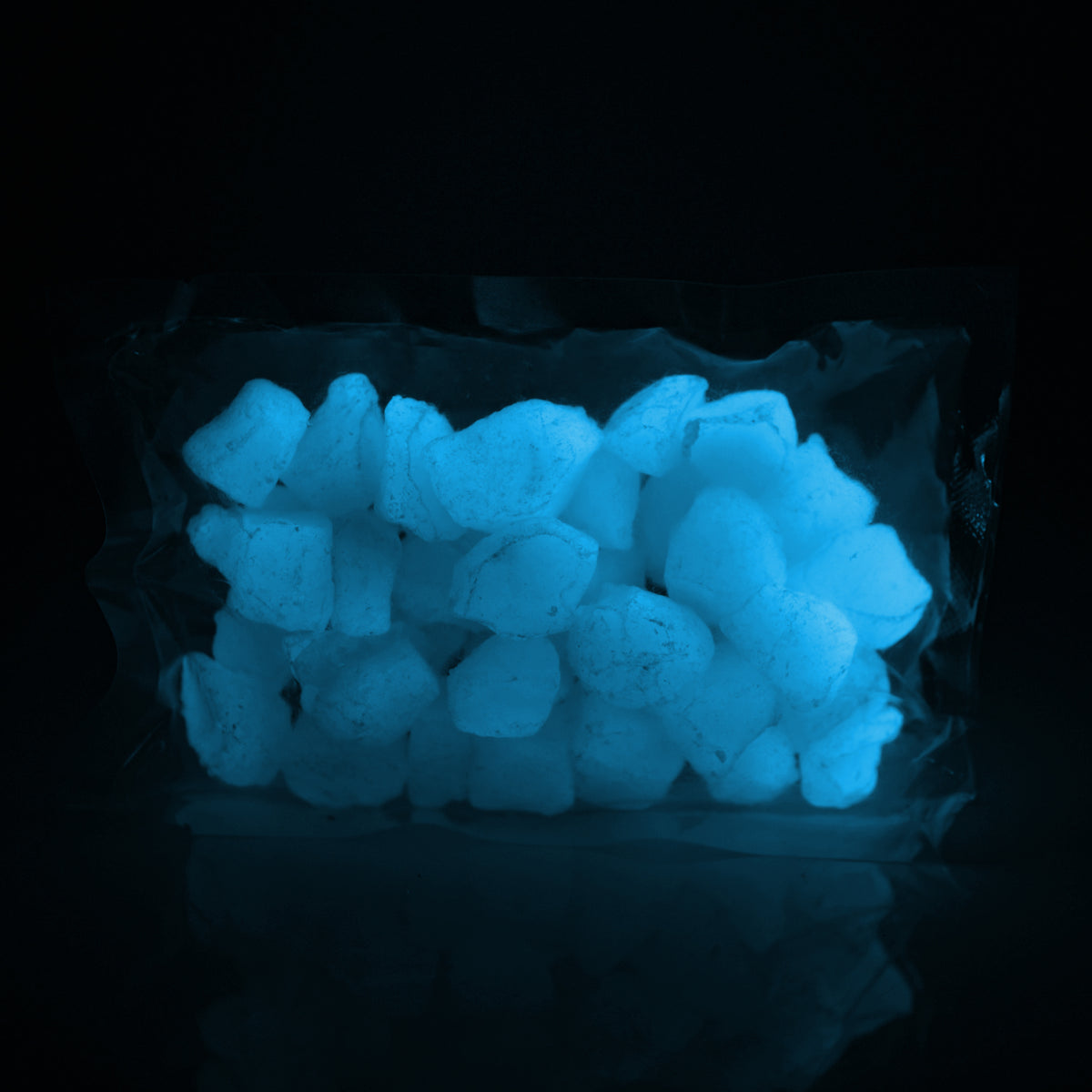 Glow Stones Blue 300 g: bag of stones glowing blue in the dark